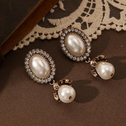 OVAL SHAPED GOLD PLATED PEARL EARRINGS