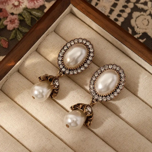 OVAL SHAPED GOLD PLATED PEARL EARRINGS